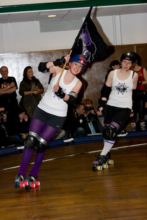 Missy with our flag in the skate out!